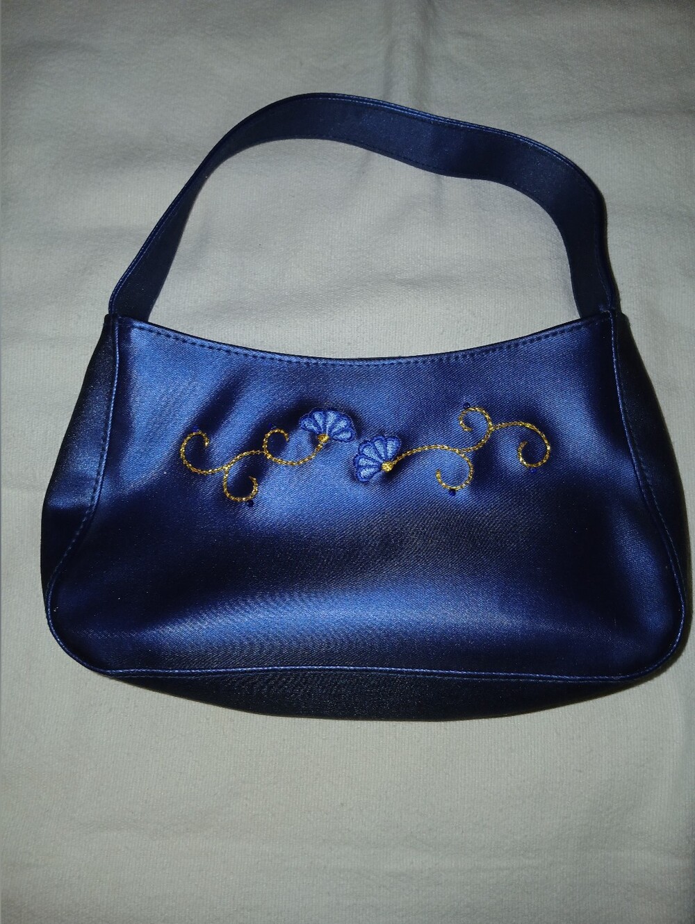 NWOT Elegant Navy Satin Shoulder Bag with Gold Floral Embroidery.